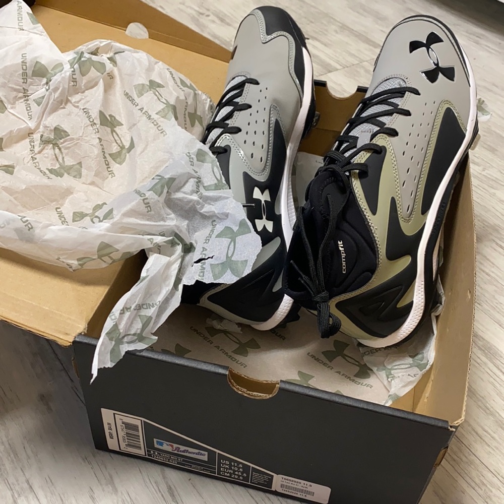New UA cleats sz 11.5
